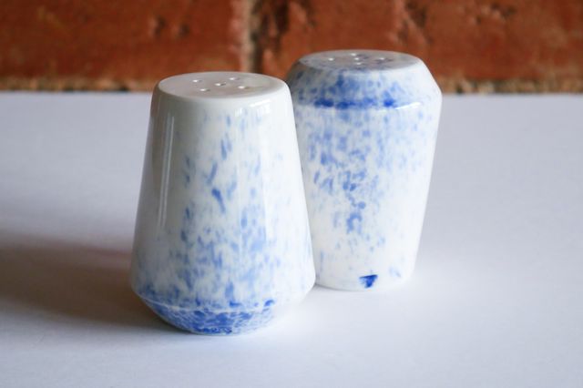 Each set includes one that flares wide at the base, with the splash of blue coming up from below - and another that flares wide at the top, with the splash from above.