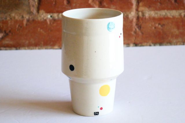 There are a number of colorful polka-dot bubbles - teal, yellow, red, and black - floating across the surface. And my small m stamp also has a black fill.
