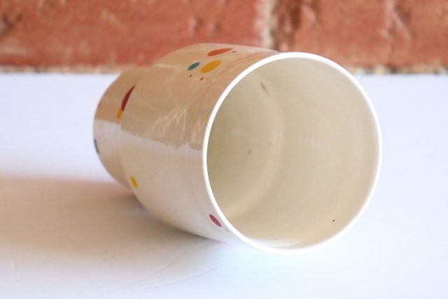 The inside is also white, and the entire piece has a glossy finish.